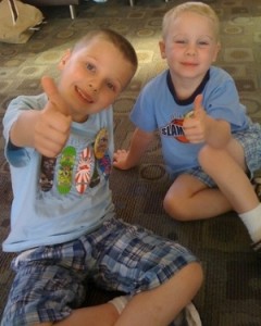 2 Kids Giving the Thumbs Up